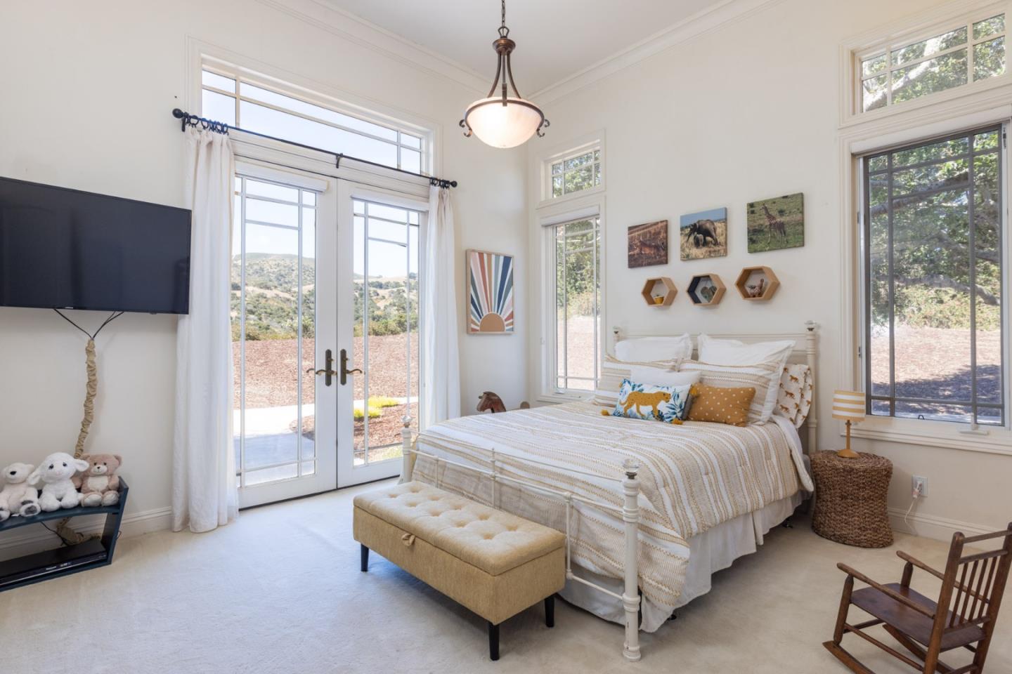 19831 Spring Ridge Terrace Salinas, CA 93908 - Photo 29 of 49 a bedroom with a bed couch and window