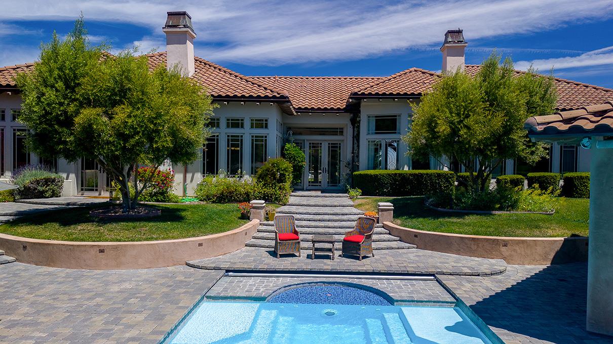 19831 Spring Ridge Terrace Salinas, CA 93908 - Photo 35 of 49 a front view of a house with porch and a fountain