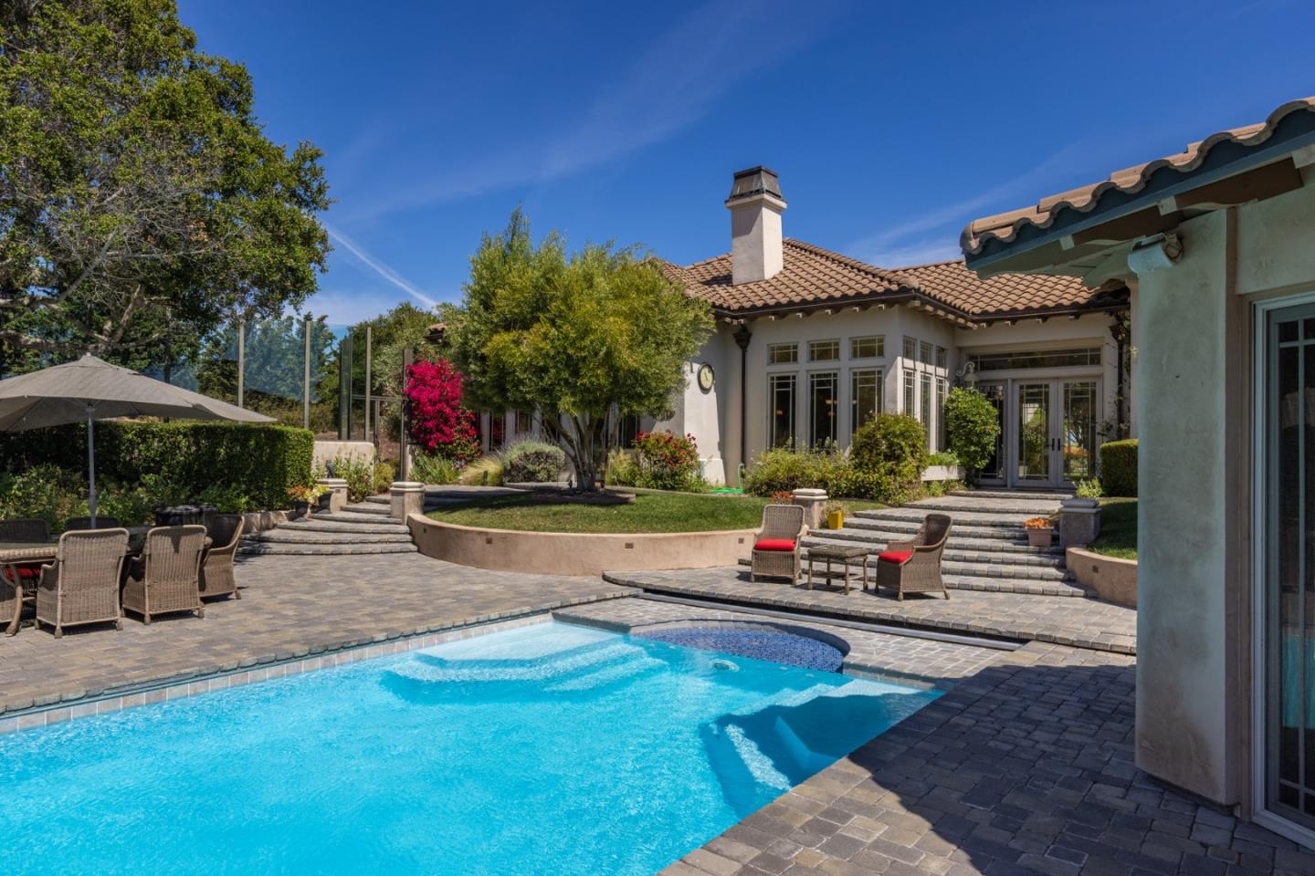19831 Spring Ridge Terrace Salinas, CA 93908 - Photo 38 of 49 a front view of a house with porch and garden