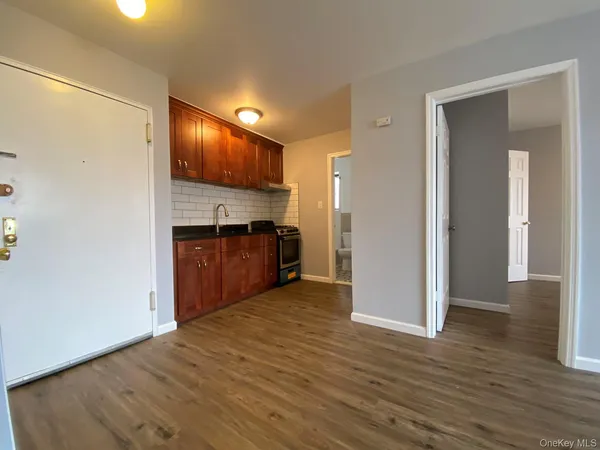 a view of a kitchen with a sink and a kitchen