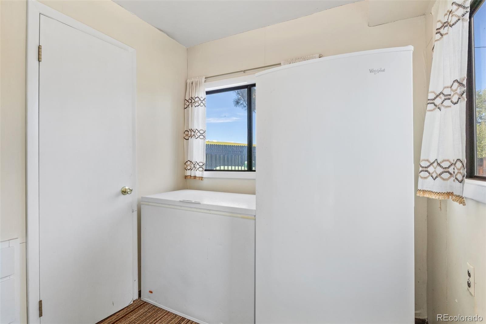 6044 Columbine Street Rye, CO 81069 - Photo 25 of 31 a bathroom with a sink and mirror