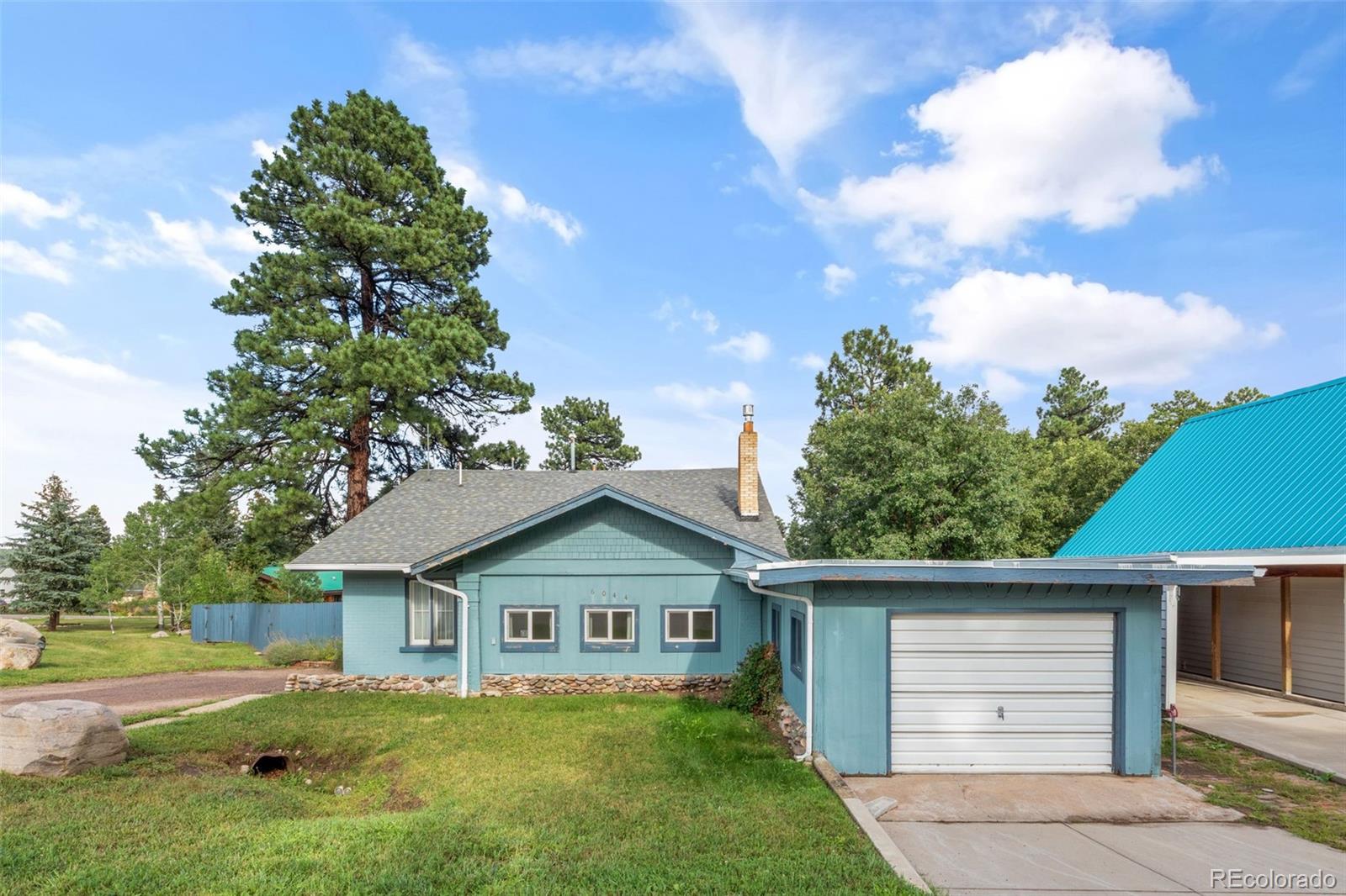 6044 Columbine Street Rye, CO 81069 - Photo 3 of 31 a view of a house with a yard