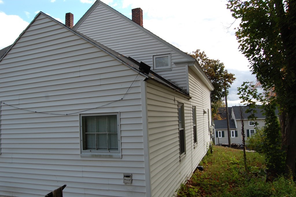 33 1/2 High Street Ware, MA 01082 - Photo 2 of 22 a view of a house with a yard