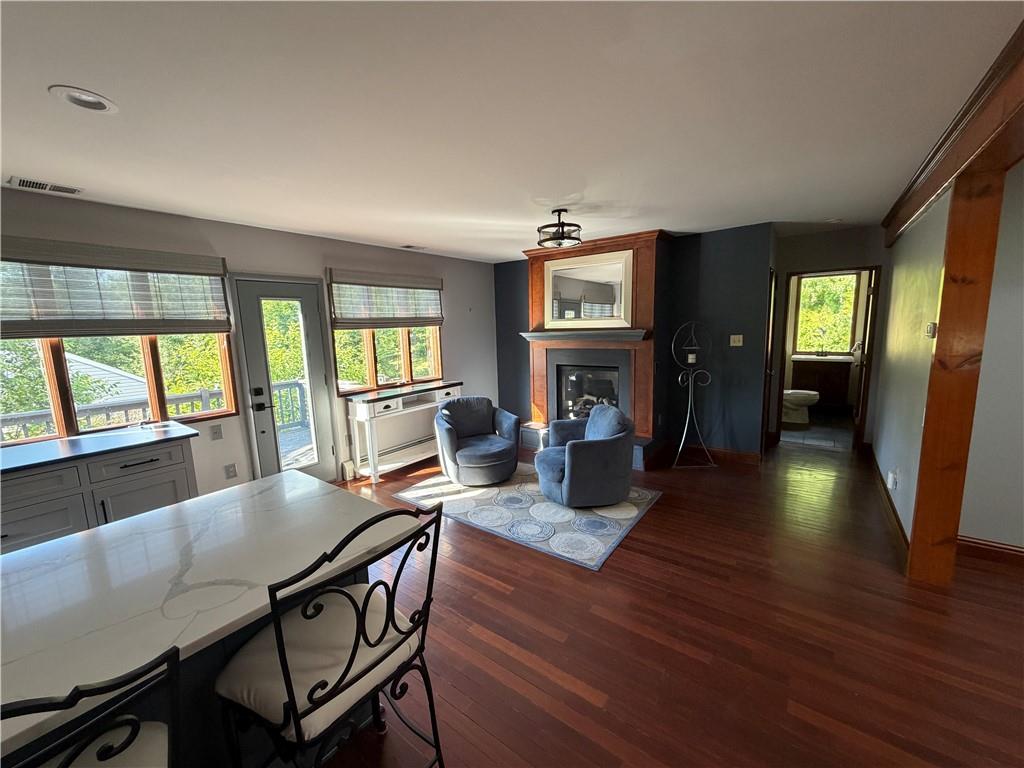 3137 Harts Run Road Allison Park, PA 15101 - Photo 6 of 11 a view of a dining room with furniture window and wooden floor