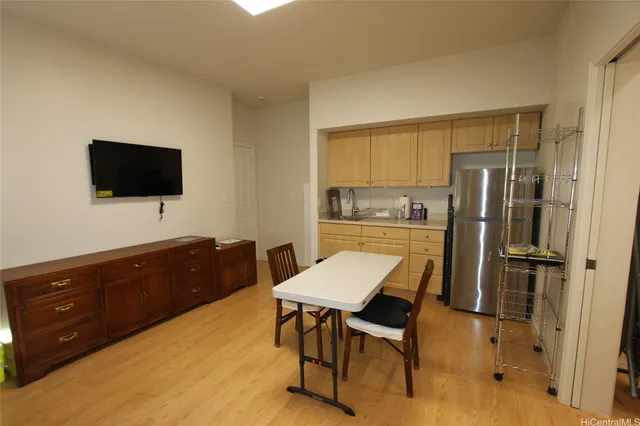 a bedroom with a bed and curtain