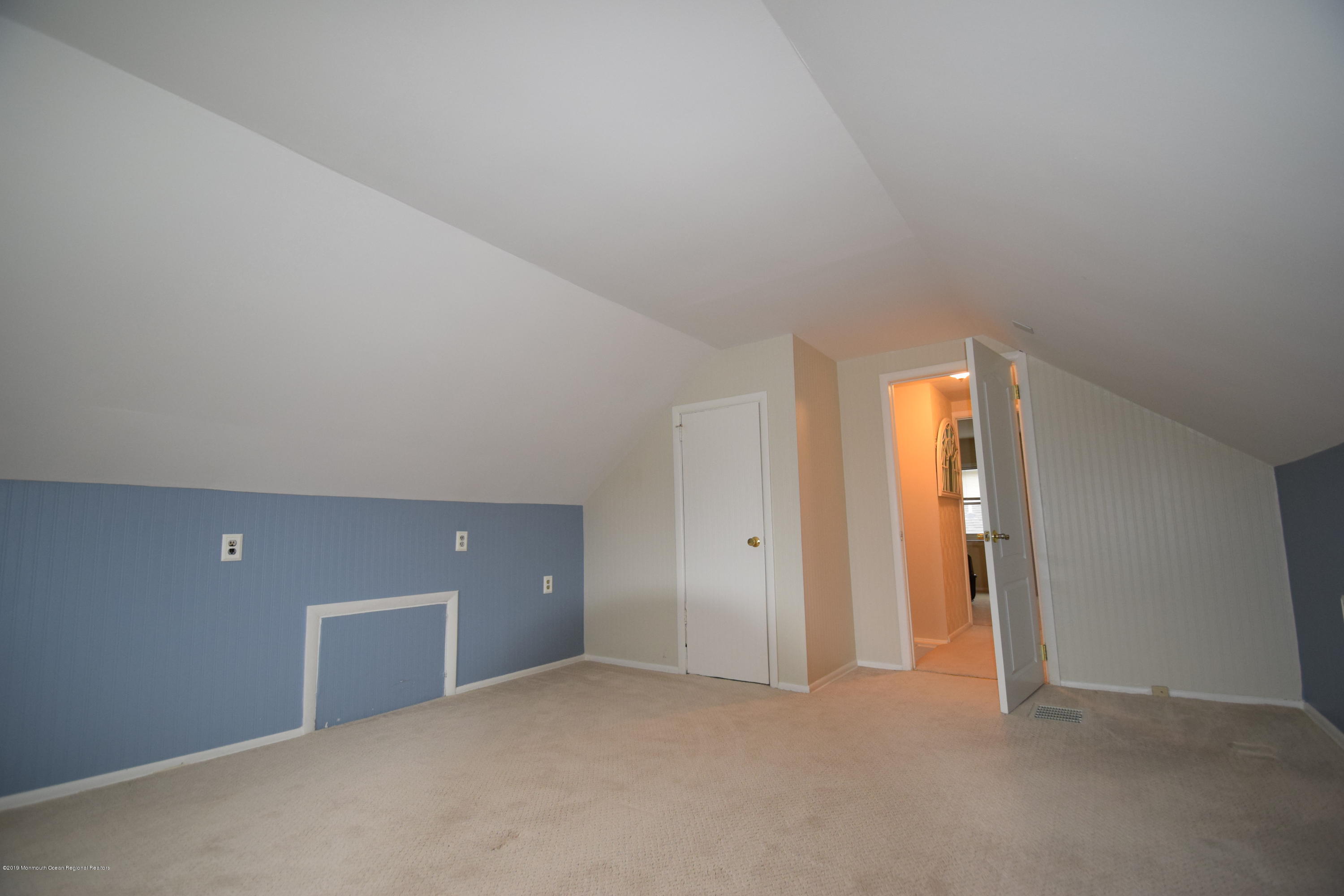 1519 Treeneedle Road Point Pleasant, NJ 08742 - Photo 14 of 21 an empty room with closet and windows