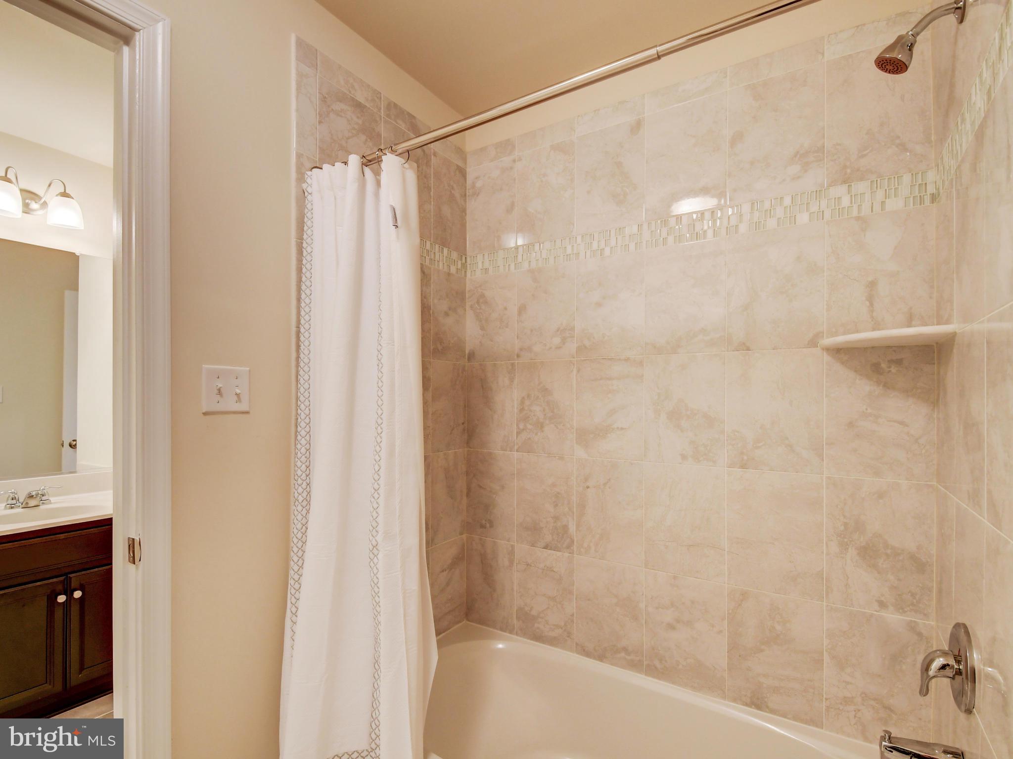 8137 Ridgely Loop Severn, MD 21144 - Photo 30 of 38 Upper Level Bathroom