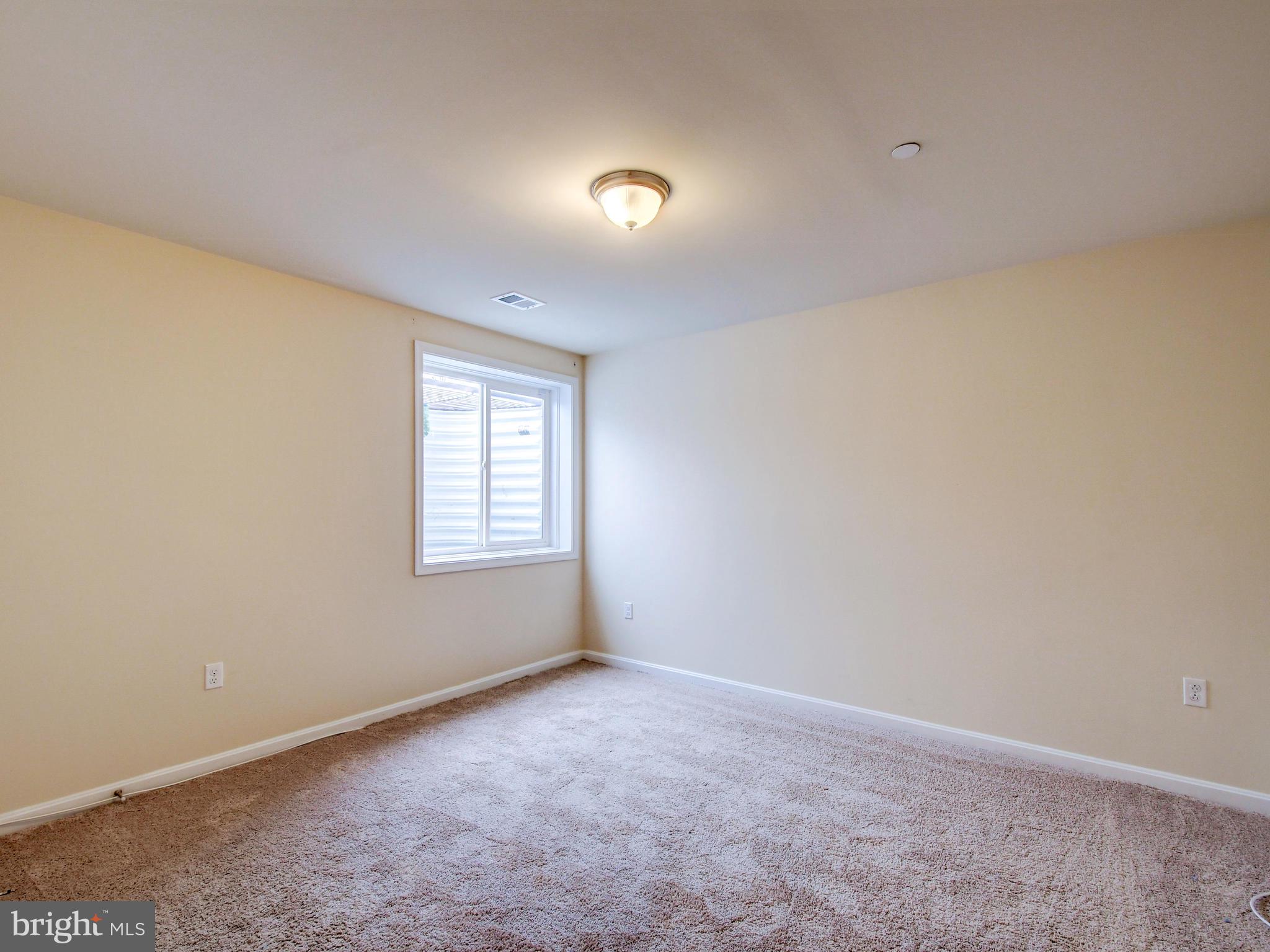 8137 Ridgely Loop Severn, MD 21144 - Photo 34 of 38 Lower Level Bedroom