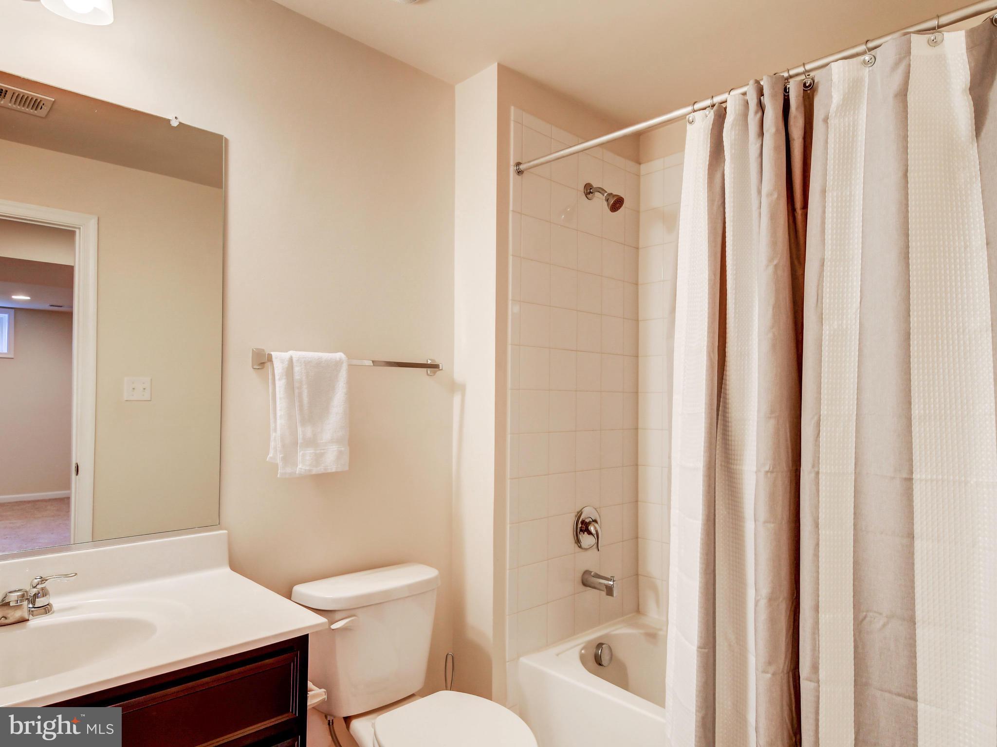8137 Ridgely Loop Severn, MD 21144 - Photo 35 of 38 Lower Level Bathroom