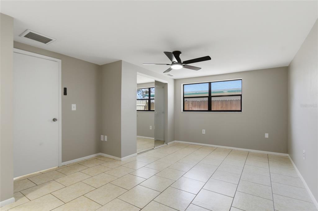 7230 San Moritz Drive Port Richey, FL 34668 - Photo 18 of 25 a view of an empty room with a window