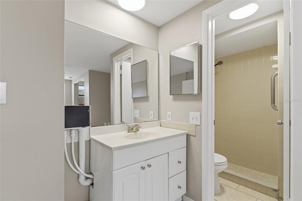 7230 San Moritz Drive Port Richey, FL 34668 - Photo 20 of 25 a bathroom with a sink and mirror