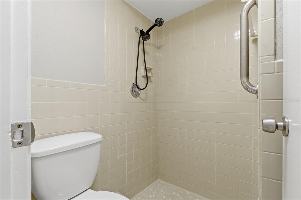 7230 San Moritz Drive Port Richey, FL 34668 - Photo 21 of 25 a bathroom with a toilet and a shower
