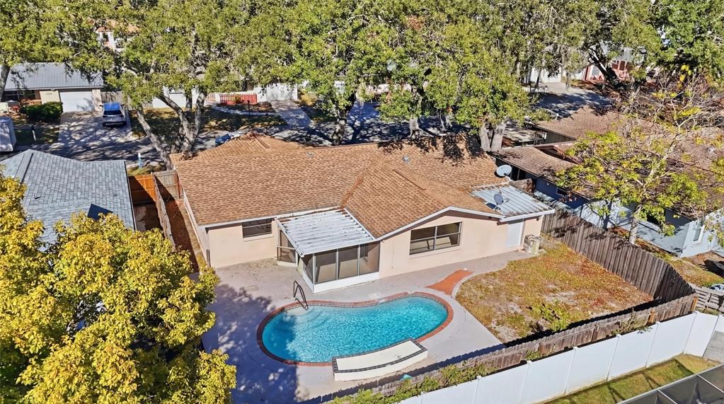 7230 San Moritz Drive Port Richey, FL 34668 - Photo 24 of 25 an aerial view of residential houses with outdoor space