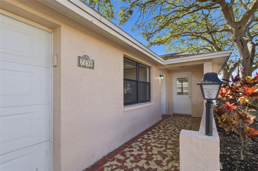 7230 San Moritz Drive Port Richey, FL 34668 - Photo 3 of 25 a bathroom with a toilet and a shower