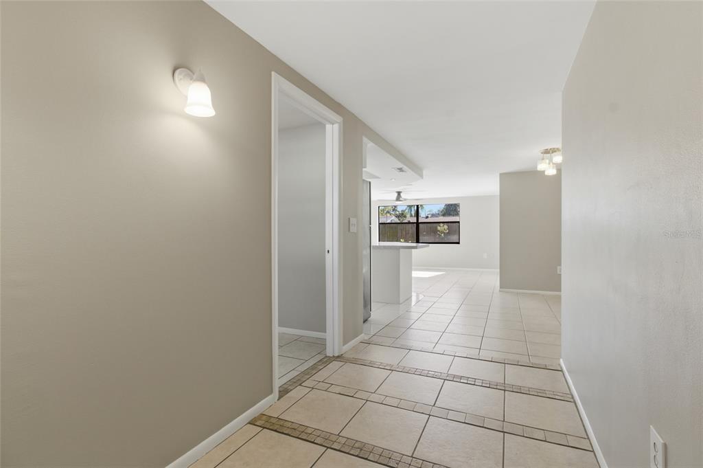 7230 San Moritz Drive Port Richey, FL 34668 - Photo 4 of 25 a view of a hallway