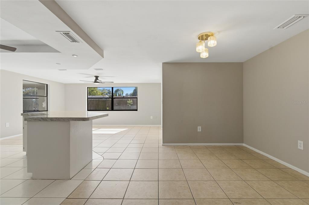 7230 San Moritz Drive Port Richey, FL 34668 - Photo 7 of 25 a view of an empty room with a window
