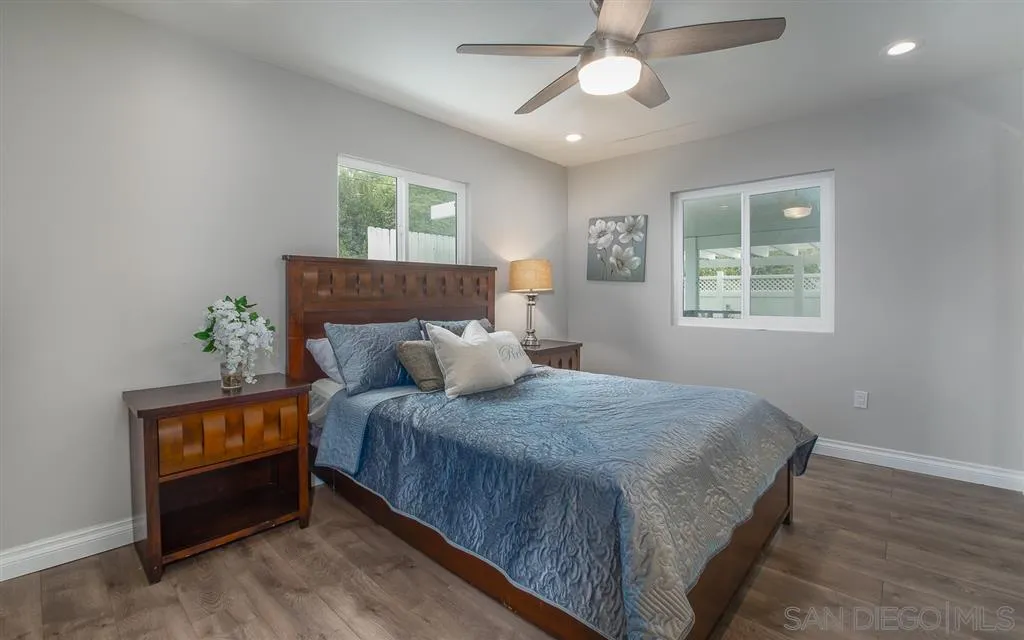 14356 Poway Road Poway, CA 92064 - Photo 13 of 25 a bedroom with a bed and a window