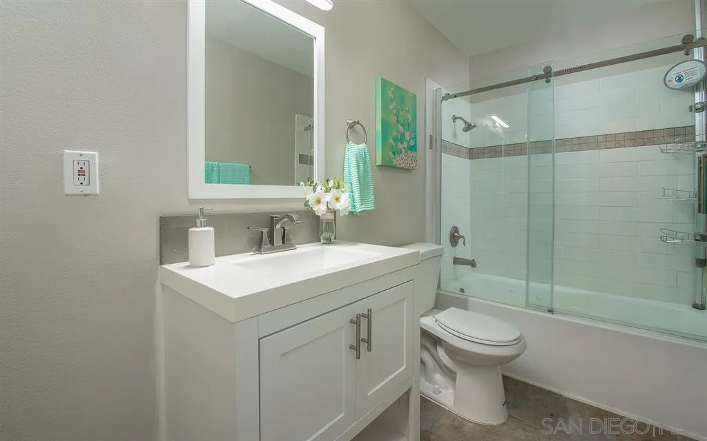14356 Poway Road Poway, CA 92064 - Photo 16 of 25 a bathroom with a sink toilet vanity and shower