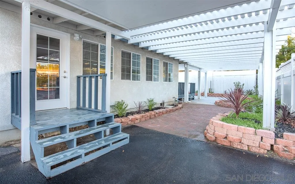 14356 Poway Road Poway, CA 92064 - Photo 2 of 25 a view of a porch with a table and chairs