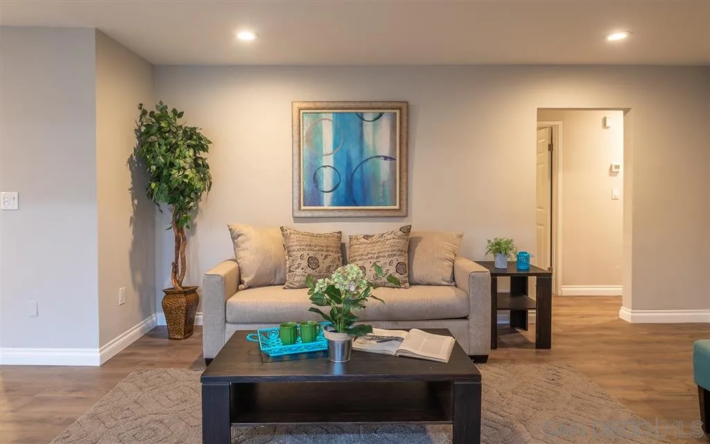 14356 Poway Road Poway, CA 92064 - Photo 8 of 25 a living room with furniture and a potted plant