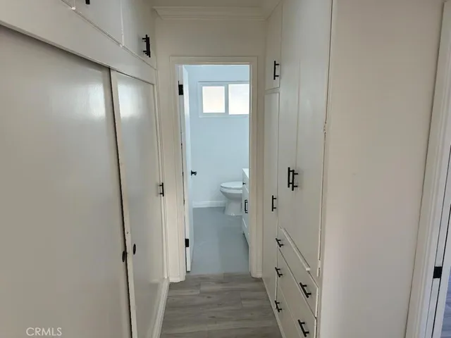a view of a bathroom from the hallway