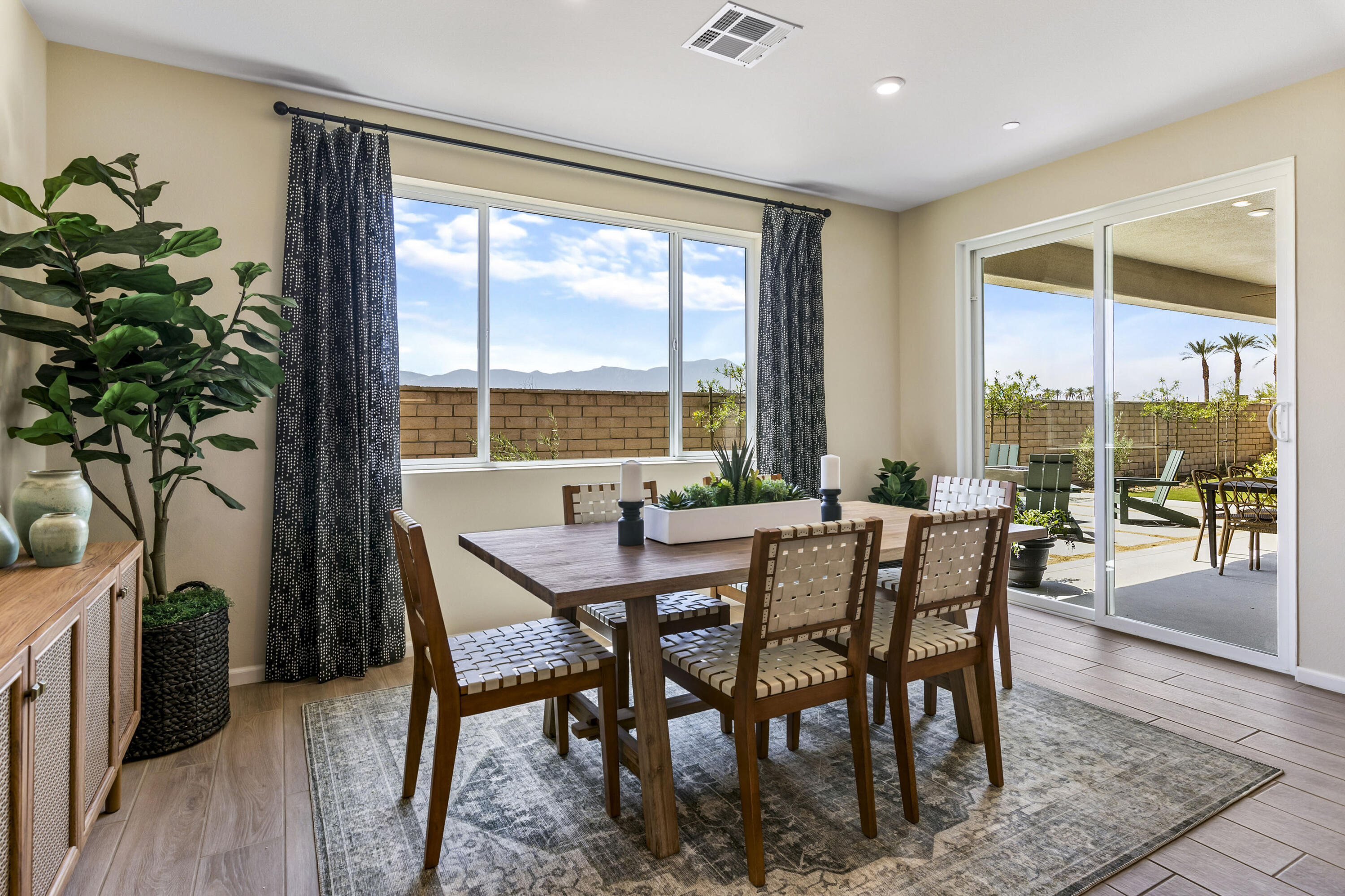 79722 Birmingham Drive Indio, CA 92203 - Photo 5 of 13 a dining room with furniture window and wooden floor