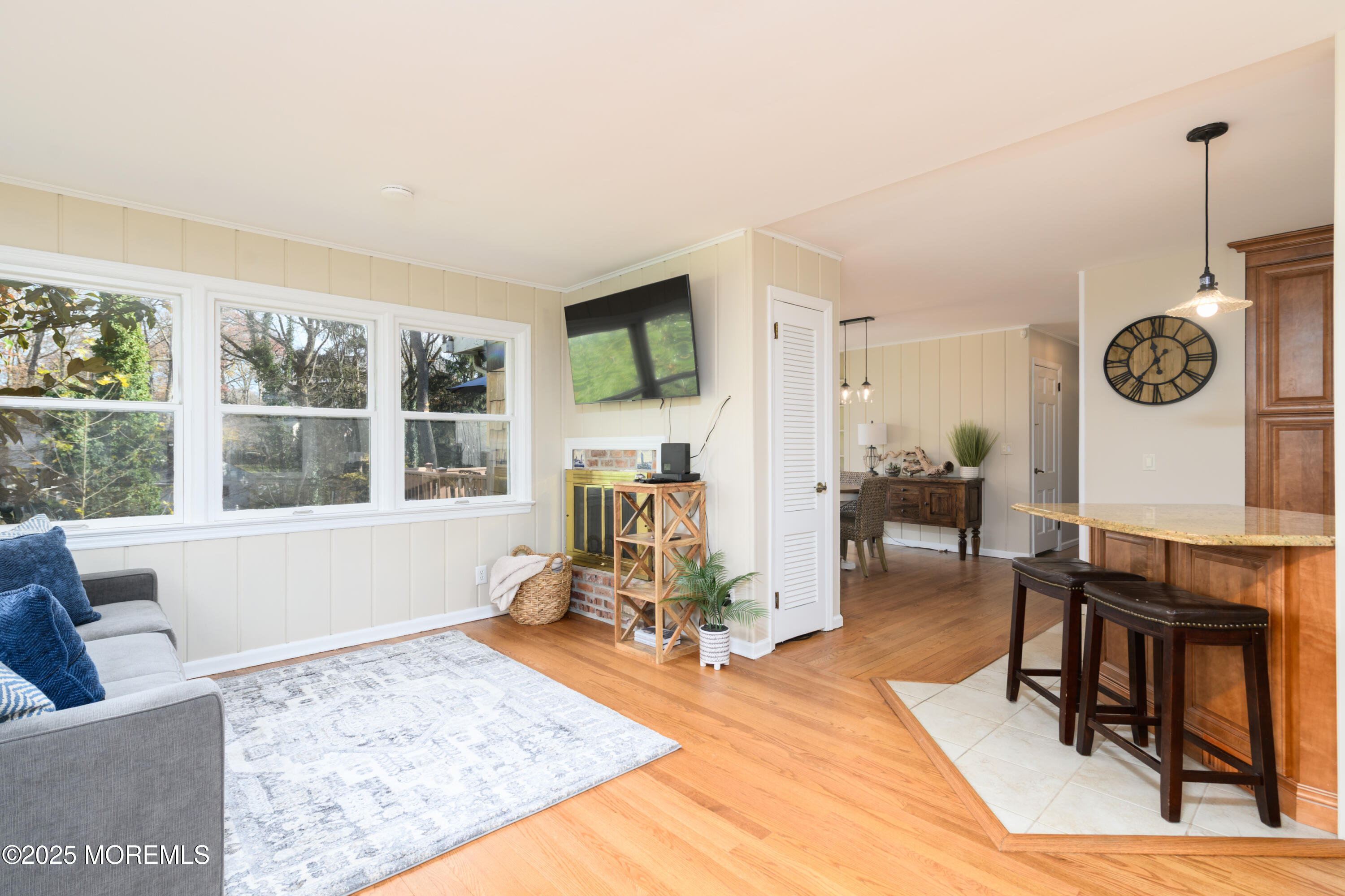 74 Fish Hawk Drive Middletown, NJ 07748 - Photo 12 of 32 a living room with furniture and a large window