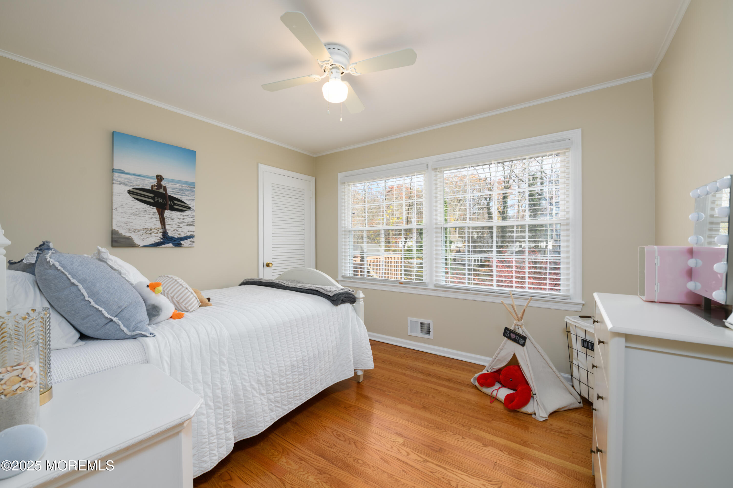 74 Fish Hawk Drive Middletown, NJ 07748 - Photo 14 of 32 a bedroom with a bed and a window