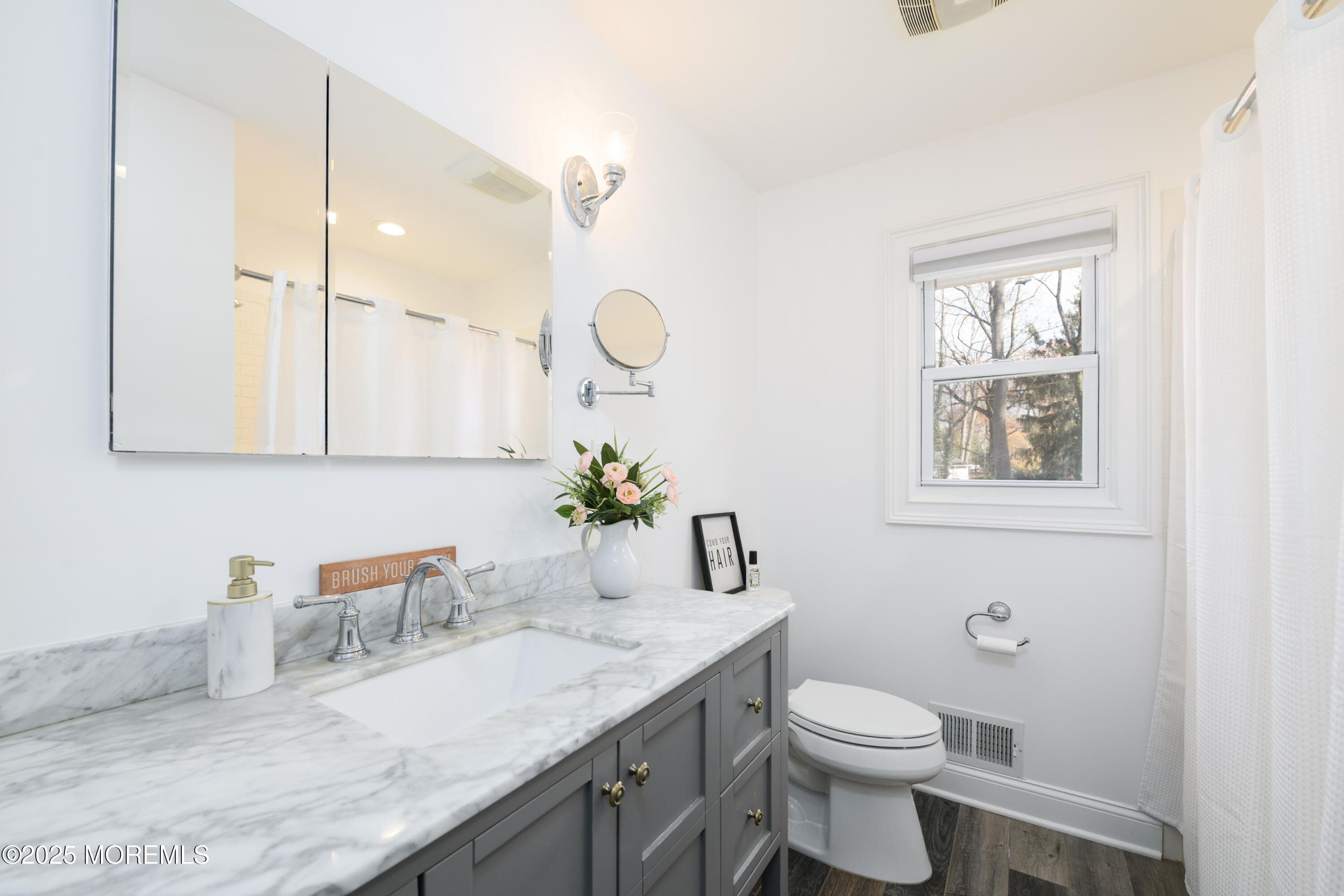 74 Fish Hawk Drive Middletown, NJ 07748 - Photo 16 of 32 a bathroom with a granite countertop sink mirror and toilet