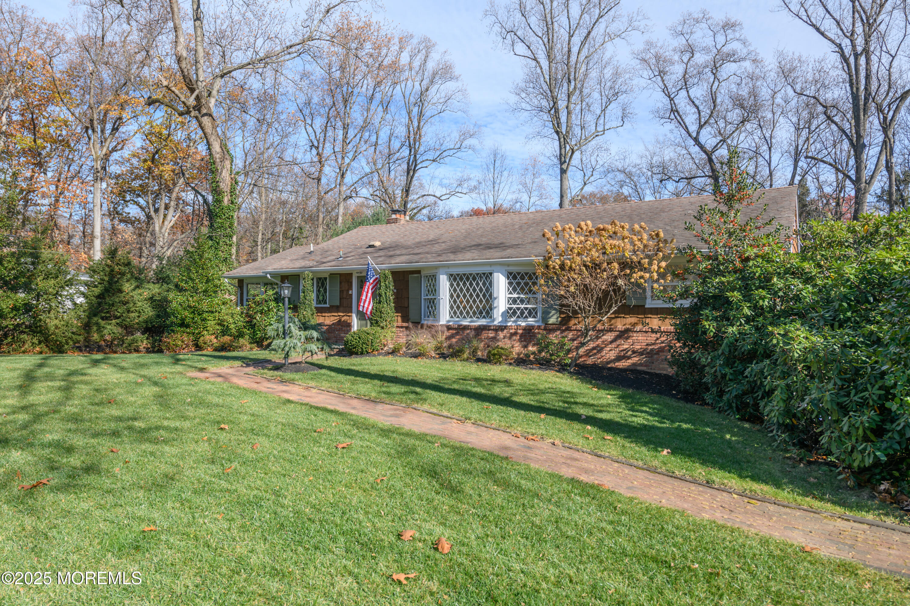 74 Fish Hawk Drive Middletown, NJ 07748 - Photo 2 of 32 a front view of a house with yard and green space