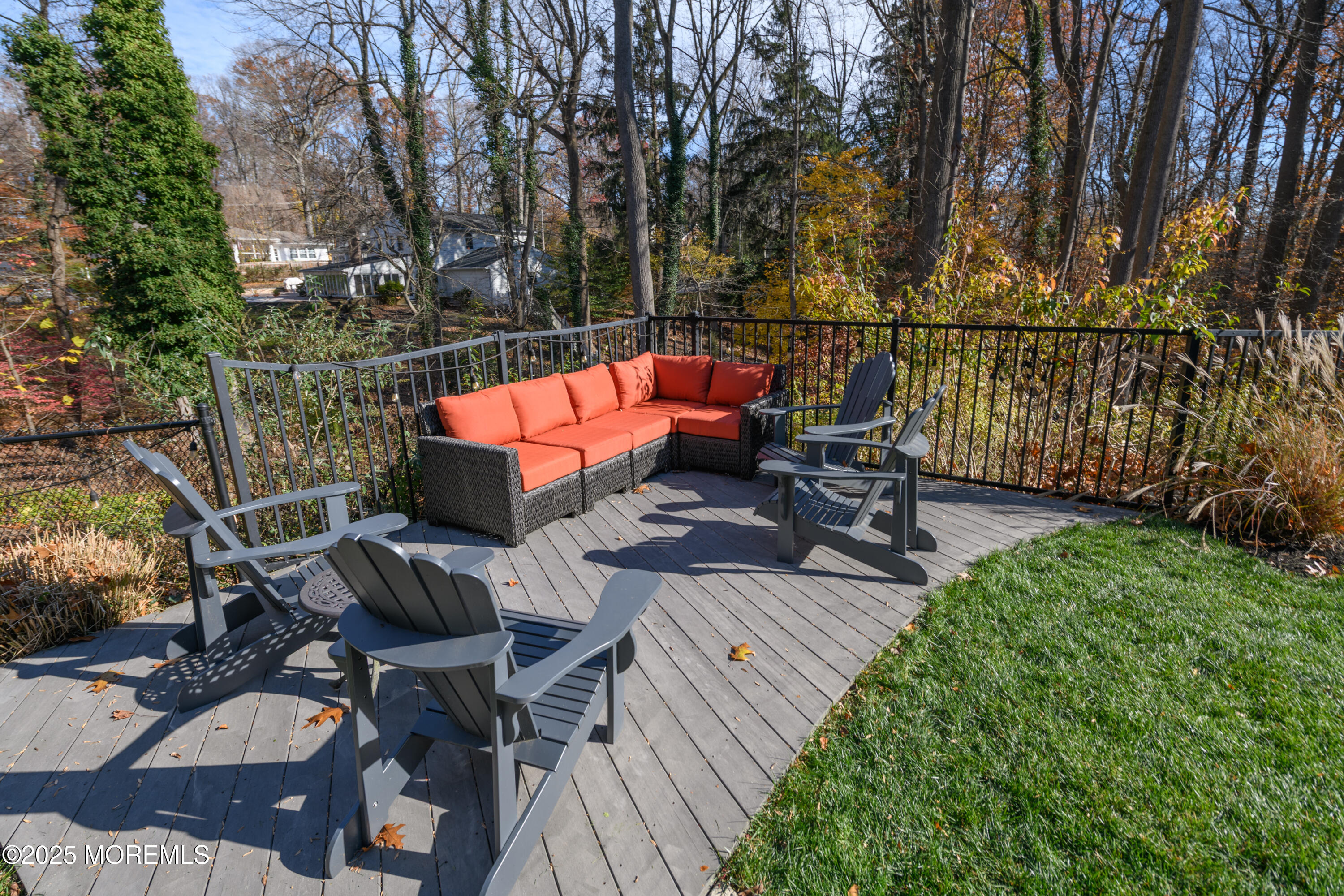 74 Fish Hawk Drive Middletown, NJ 07748 - Photo 25 of 32 a view of balcony with wooden floor and outdoor seating