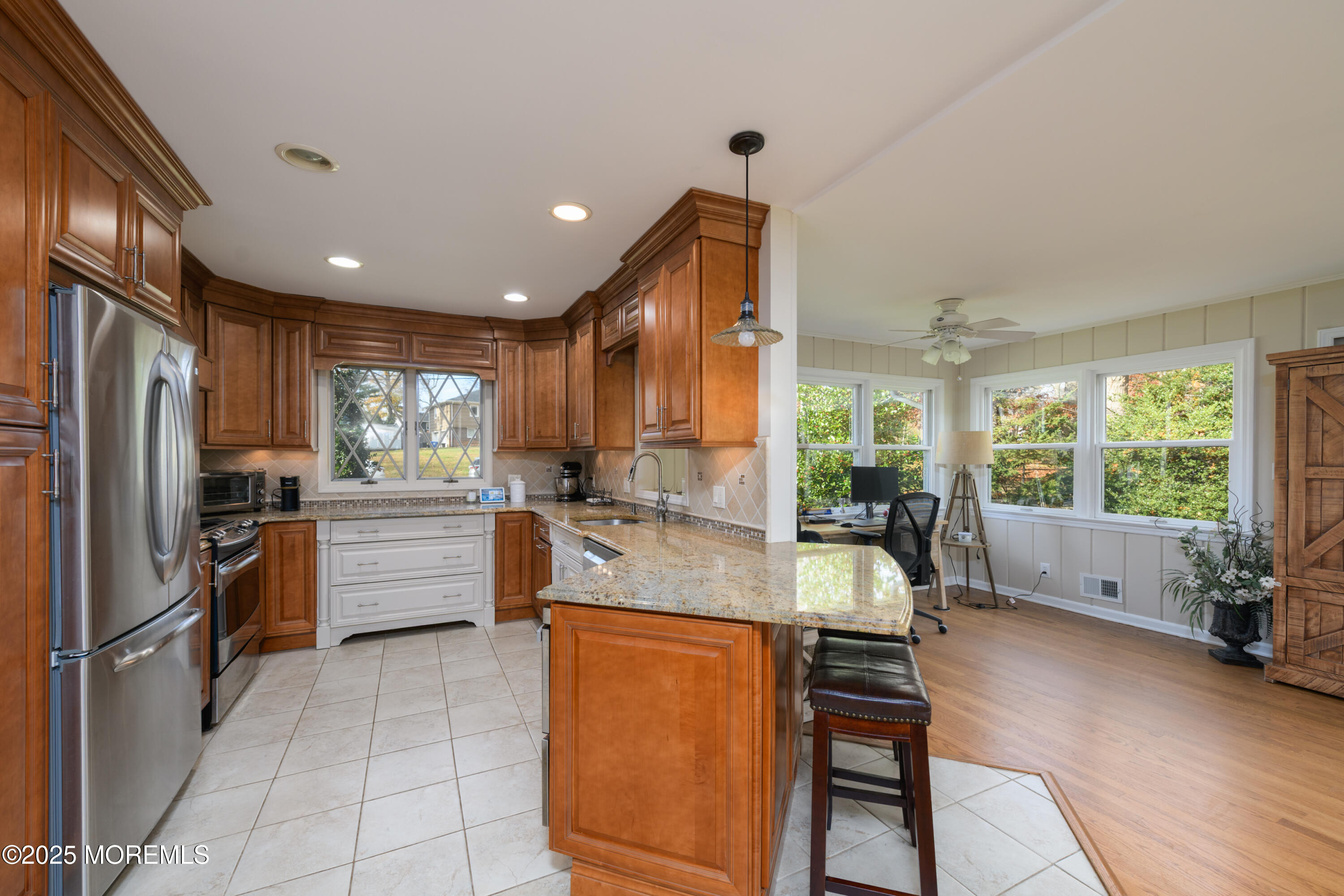 74 Fish Hawk Drive Middletown, NJ 07748 - Photo 10 of 32 a large kitchen with sink refrigerator and cabinets