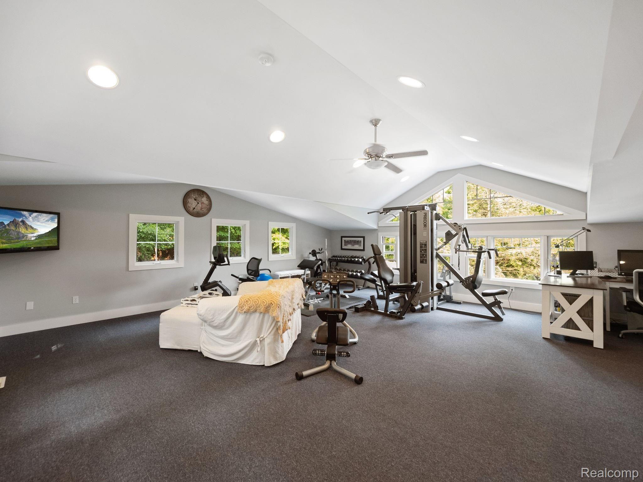 770 Lakeville Road Leonard, MI 48367 - Photo 56 of 57 3rd bedroom loft used as gym and work from home space