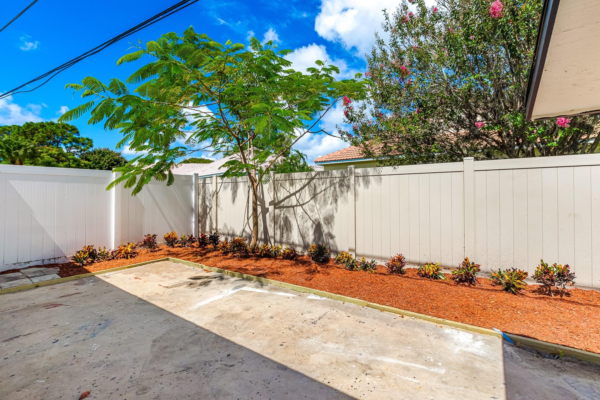 4433 Southeast Village Road Stuart, FL 34997 - Photo 8 of 35 Backyard Patio
