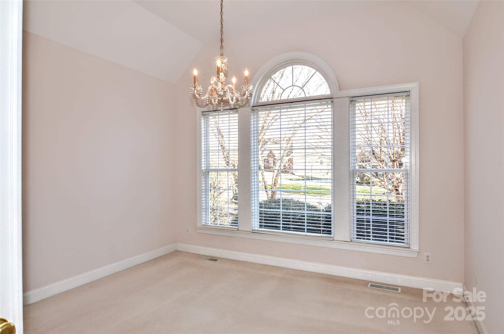 125 Eaglecrest Drive Matthews, NC 28104 - Photo 18 of 28 a view of an empty room with a window