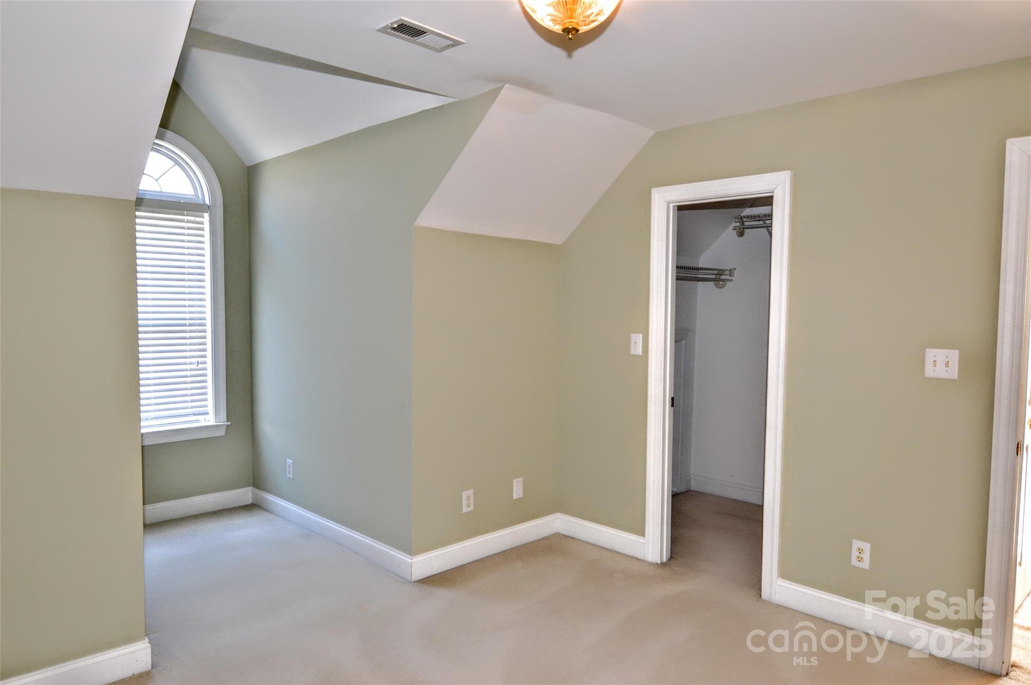 125 Eaglecrest Drive Matthews, NC 28104 - Photo 20 of 28 an empty room with windows and closet