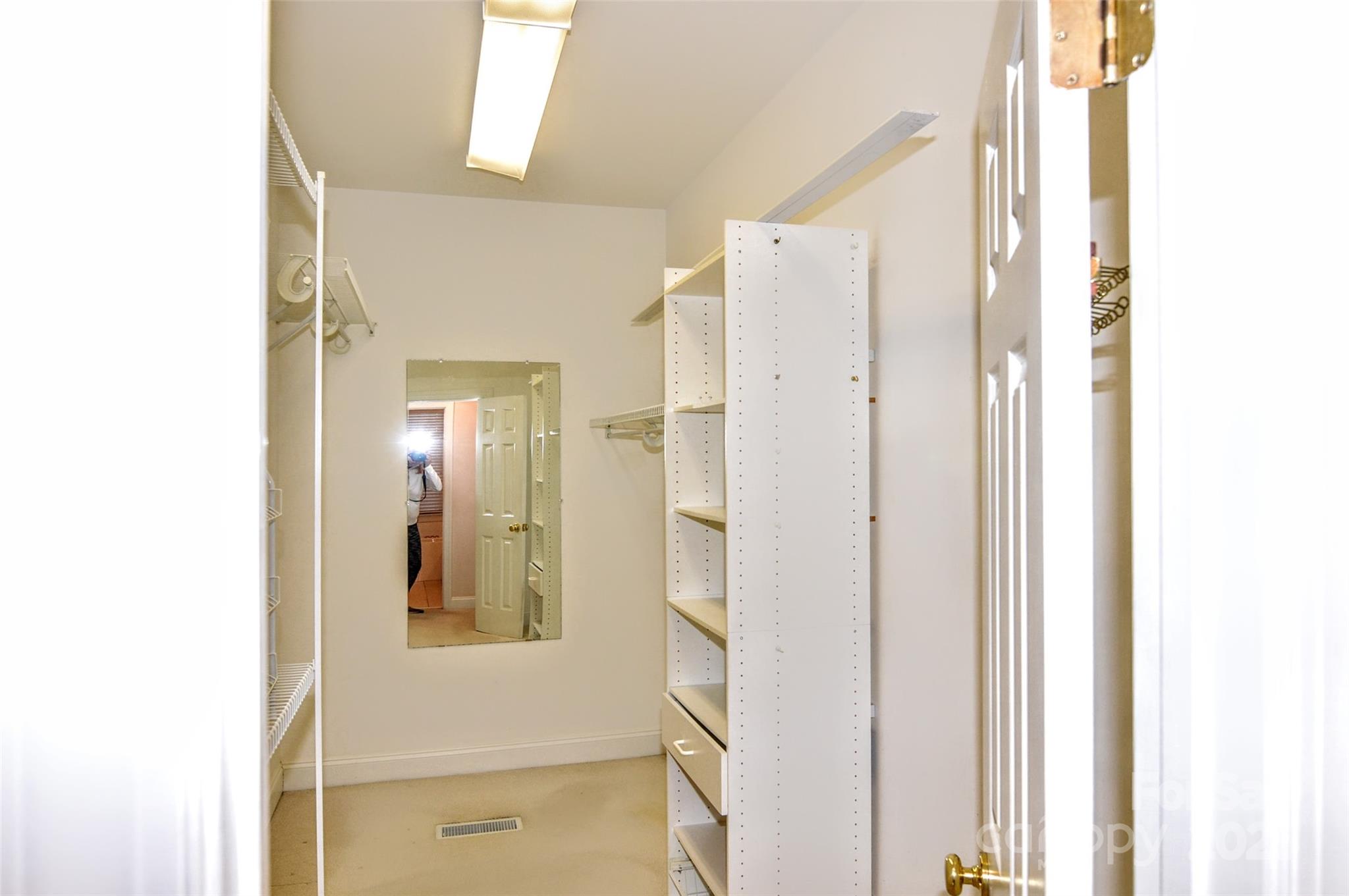 125 Eaglecrest Drive Matthews, NC 28104 - Photo 10 of 28 a view of a bathroom from a hallway