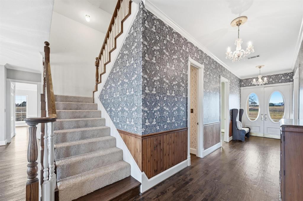 707 Cullins Road Rockwall, TX 75032 - Photo 24 of 40 a view of an entryway with wooden floor
