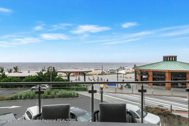 a view of a swimming pool with seating area