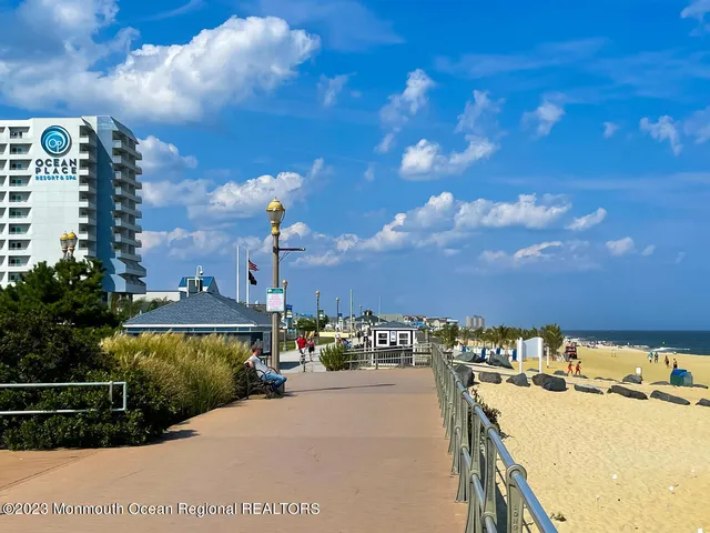 a view of street with sitting area