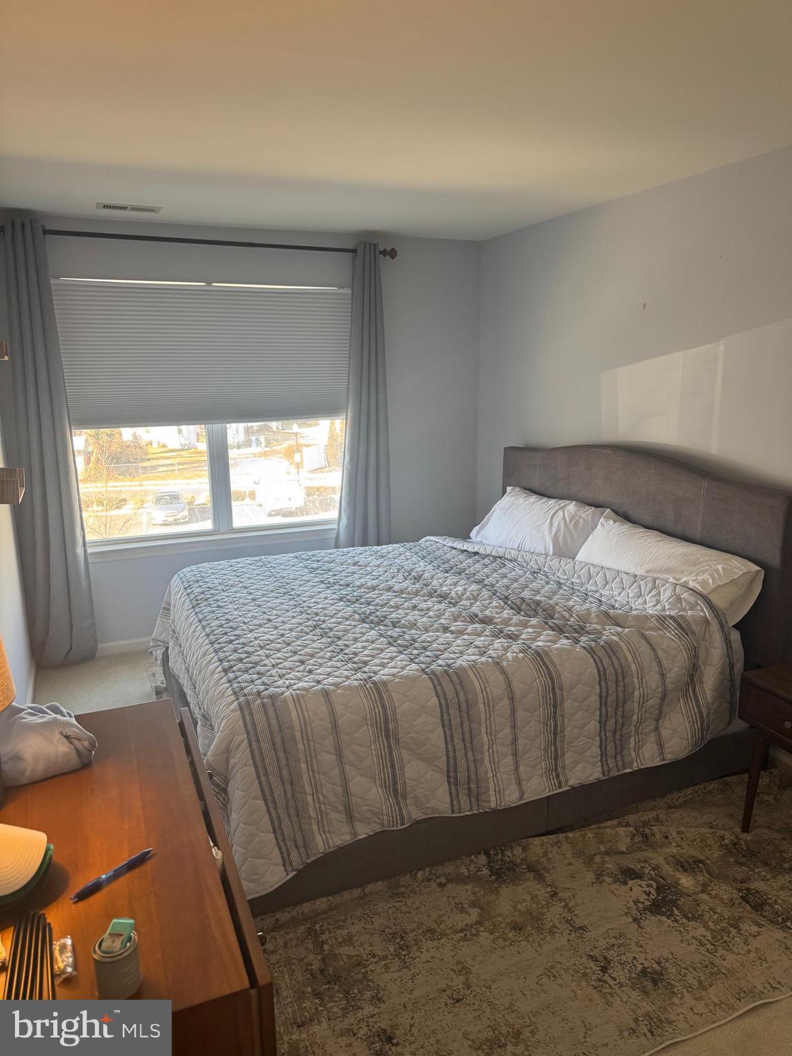 43 Poplar Street Glassboro, NJ 08028 - Photo 11 of 16 a bedroom with a bed and window