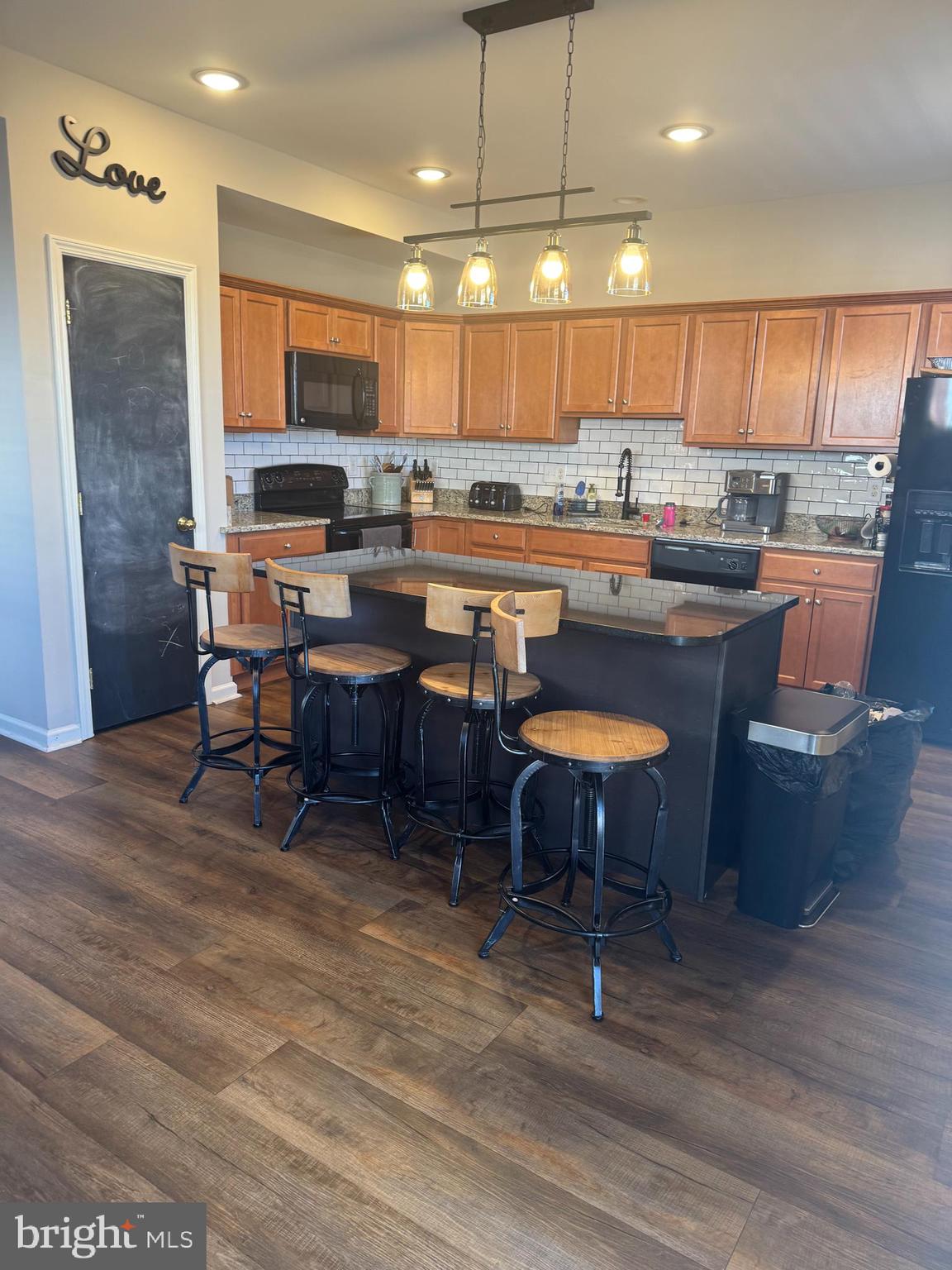 43 Poplar Street Glassboro, NJ 08028 - Photo 2 of 16 a kitchen with a table chairs and a kitchen view
