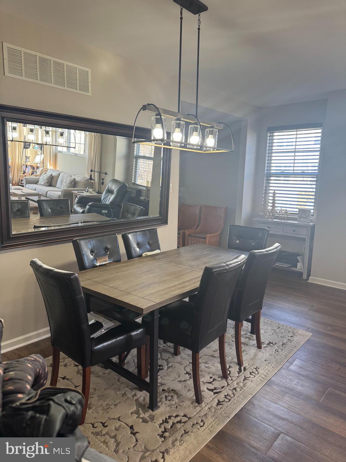 43 Poplar Street Glassboro, NJ 08028 - Photo 4 of 16 a view of a dining room with furniture wooden floor and chandelier