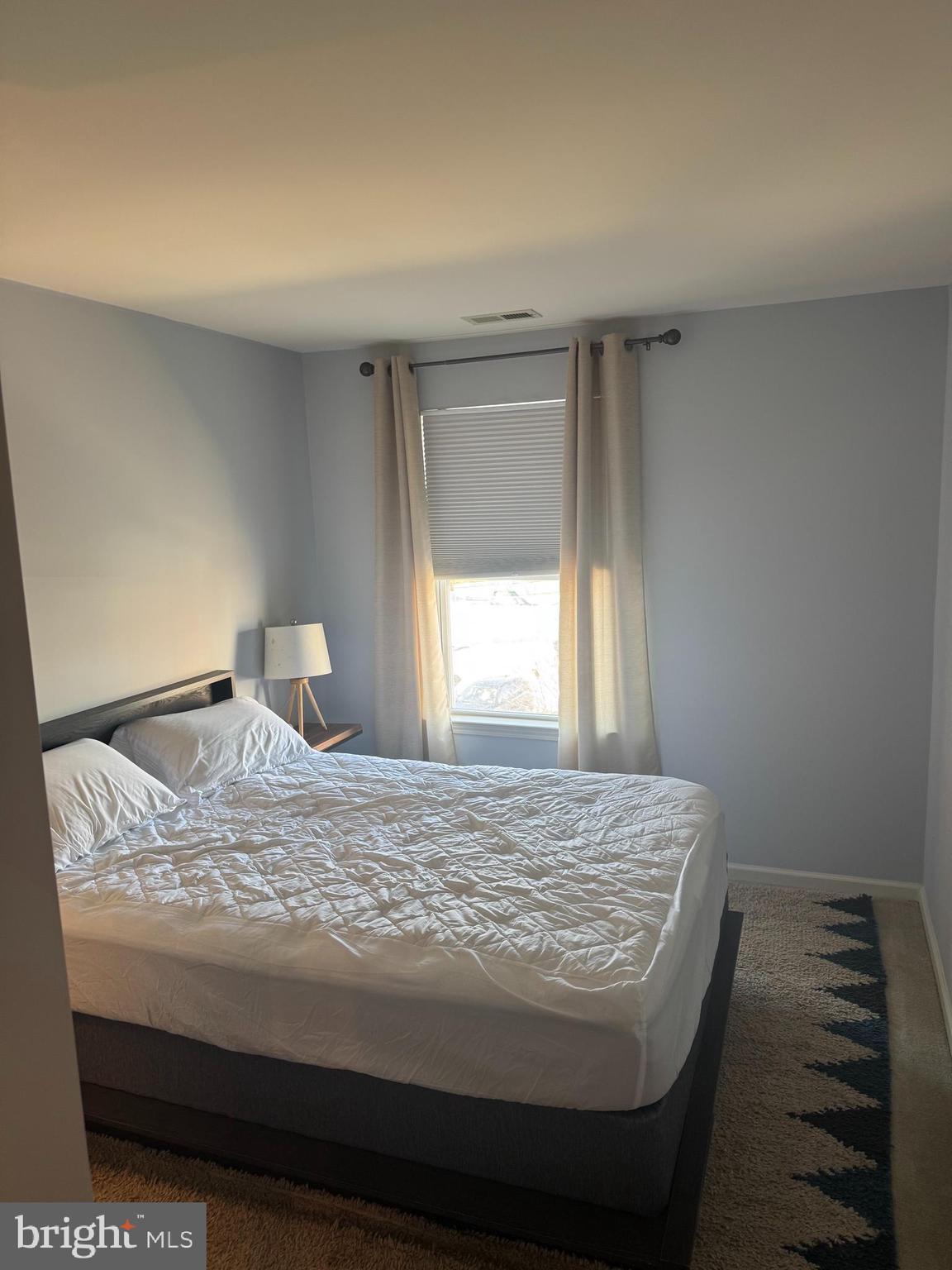 43 Poplar Street Glassboro, NJ 08028 - Photo 10 of 16 a room with a bed