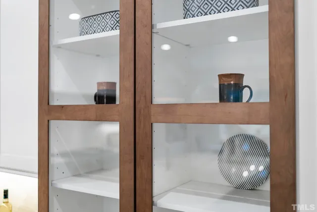 a bathroom with a tub and window