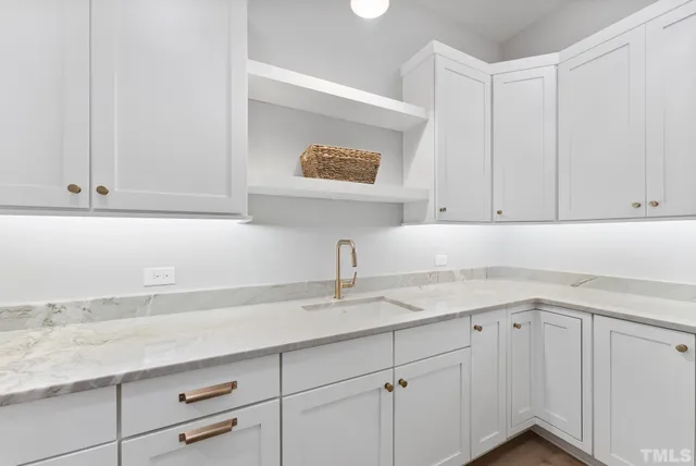 an entryway with wooden floor
