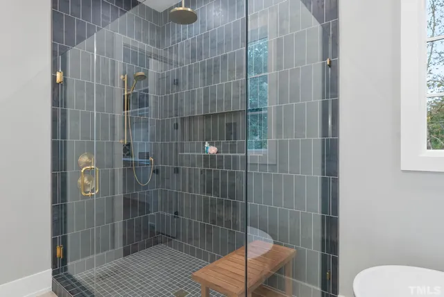 a view of a houses with a cars park