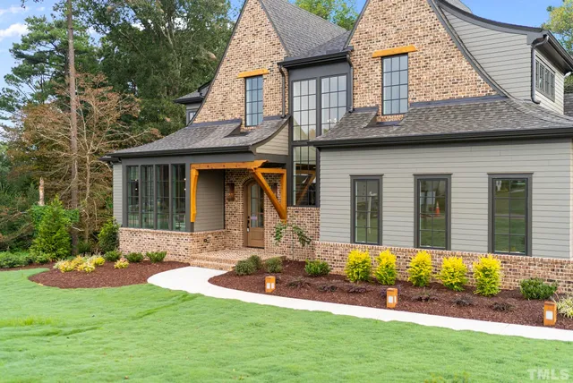 front view of a house with a yard