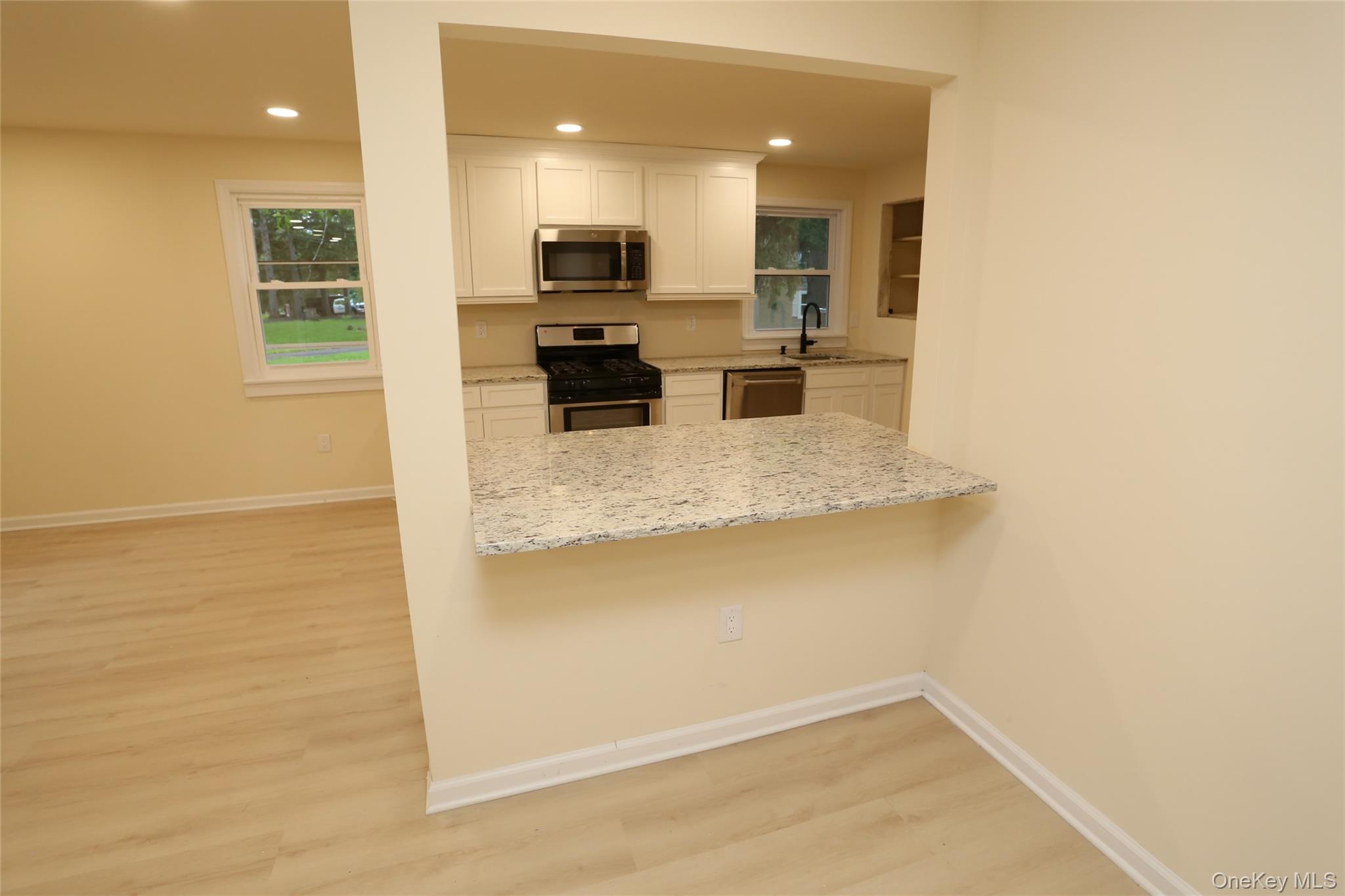 20 Pineview Road West Nyack, NY 10994 - Photo 14 of 36 a view of a kitchen with microwave and stove