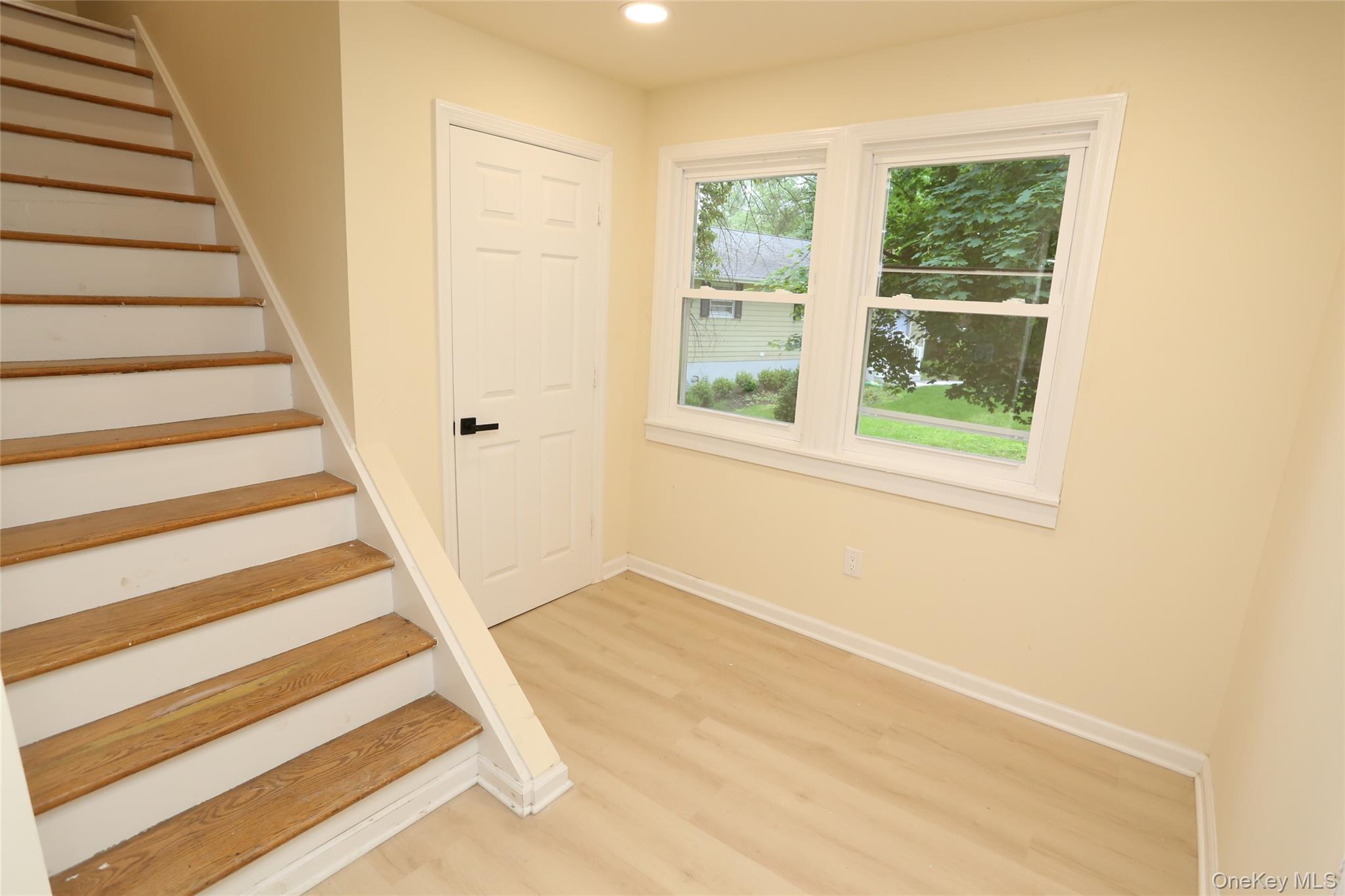 20 Pineview Road West Nyack, NY 10994 - Photo 20 of 36 a view of a livingroom with a staircase